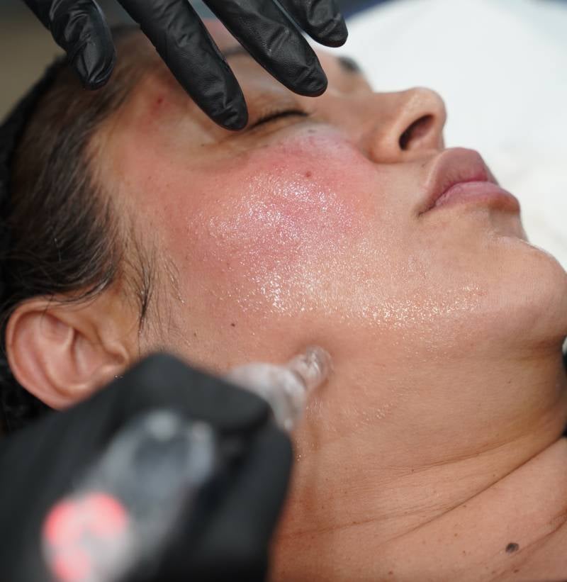 A person's leg being massaged