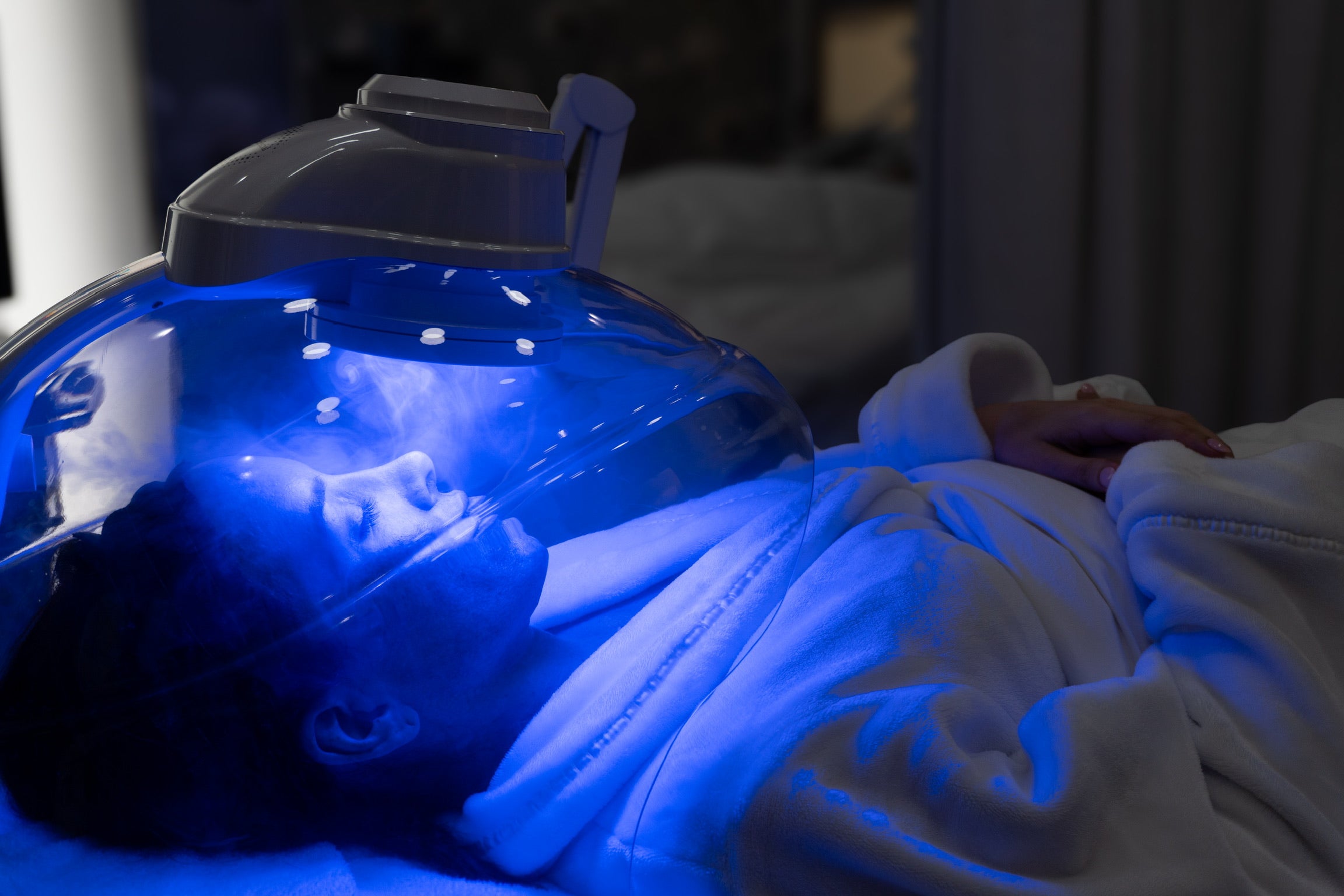 Woman getting an oxygen facial