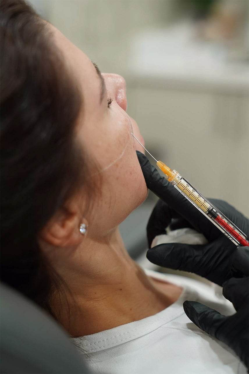 Woman getting an injection