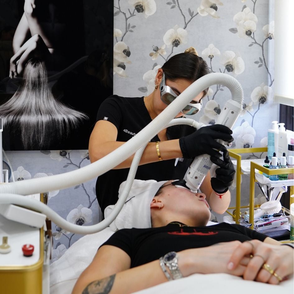A person's leg being massaged