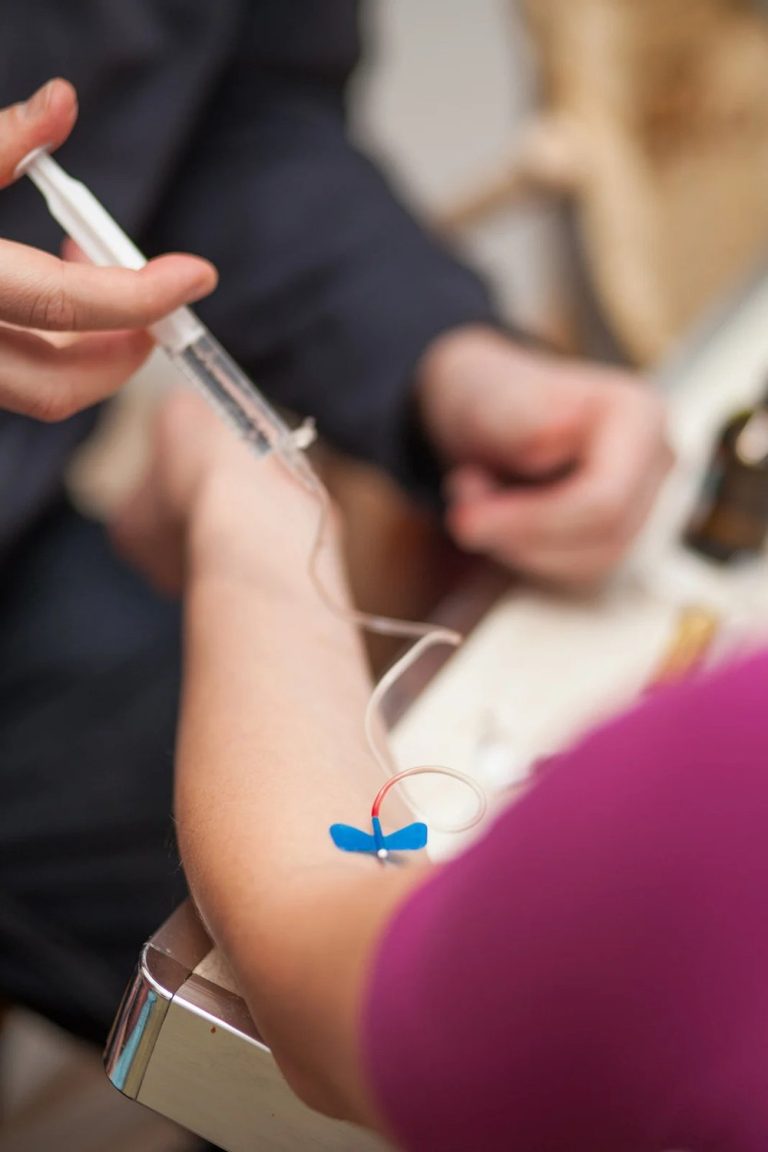 close up of person getting iv therapy
